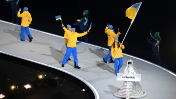 Росіянка, яка несла табличку України на ОІ-2026, зробила заяву: «‎Мають повне право відчувати ненависть»